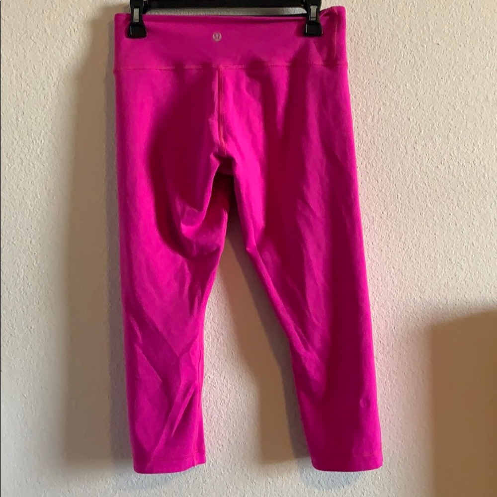 Reversible pink and black lululemon crop leggings